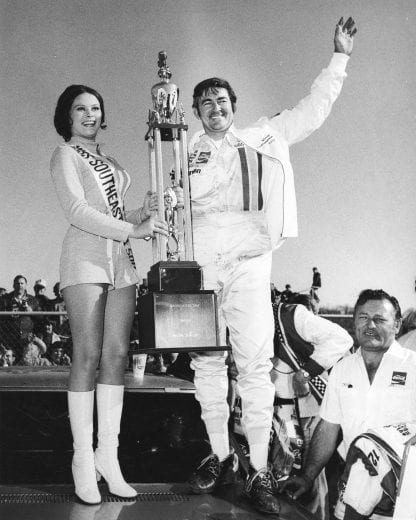 BRISTOL, TN — April 9, 1972: Bobby Allison in victory lane after winning the Southeastern 500 NASCAR Cup race at Bristol International Speedway. Allison would also go on to win the Volunteer 500 later in the year at Bristol, part of a 10 win season for Allison and the Coca-Cola Chevrolets owned by Richard Howard. (Photo by ISC Images & Archives via Getty Images)