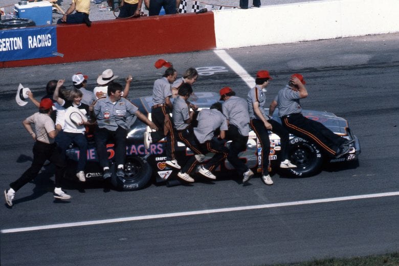 TALLADEGA, AL — May 3. 1981: Bobby Allison carries his crew toward victory lane after winning the Winston 500 NASCAR Cup race at Talladega Superspeedway. (Photo by ISC Images & Archives via Getty Images)