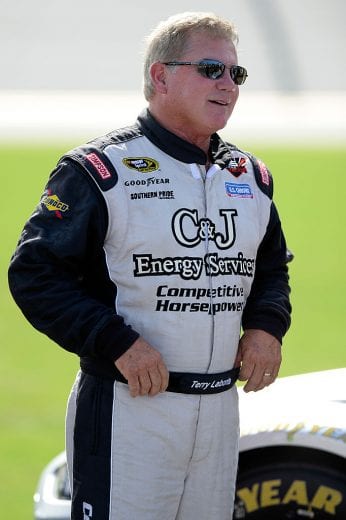 DAYTONA BEACH, FL - JULY 05: Terry Labonte, driver of the #32 C & J Energy Ford, stands on the grid during qualifying for the NASCAR Sprint Cup Series Coke Zero 400 at Daytona International Speedway on July 5, 2013 in Daytona Beach, Florida. (Photo by John Harrelson/Getty Images) | Getty Images