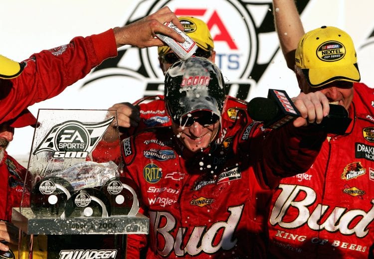 TALLADEGA, AL - OCTOBER 3: Dale Earnhardt Jr. celebrates in victory lane after winning the NASCAR Nextel Cup EA Sports 500 on October 3, 2004 at Talladega Superspeedway in Talladega, Alabama. (Photo by Jonathan Ferrey/Getty Images) | Getty Images