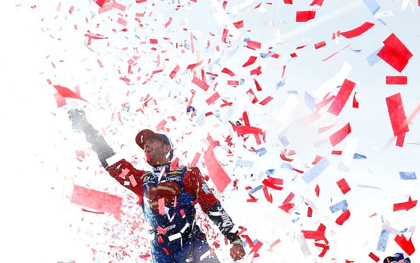 FONTANA, CA - MARCH 20: Jimmie Johnson, driver of the #48 Lowe's / Superman Chevrolet, celebrates in victory lane after winning the NASCAR Sprint Cup Series Auto Club 400 at Auto Club Speedway on March 20, 2016 in Fontana, California. (Photo by Jonathan Ferrey/Getty Images) | Getty Images