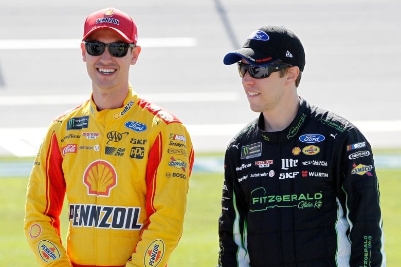 TALLADEGA, AL - MAY 06:  Joey Logano, driver of the #22 Shell Pennzoil Ford, talks to Brad Keselowski, driver of the #2 Fitzgerald Glider Kits Ford, on the grid during qualifying for the Monster Energy NASCAR Cup Series GEICO 500 at Talladega Superspeedway on May 6, 2017 in Talladega, Alabama.  (Photo by Brian Lawdermilk/Getty Images) | Getty Images