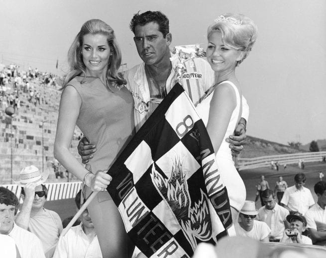 BRISTOL, TN - JULY 21, 1968: David Pearson won both Bristol races in ?68. Here Pearson enjoys Victory Lane after taking the Volunteer 500 win over Cale Yarborough. (Photo by ISC Archives via Getty Images)
