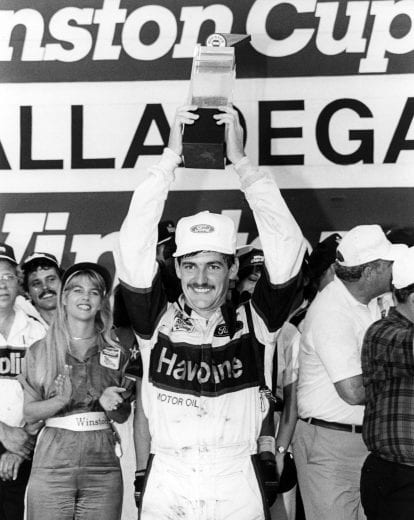 TALLADEGA, AL - MAY 07: Davey Allison, driver of the #28 Havoline Ford, celebrates in Victory Lane after winning the NASCAR Winston Cup Series Winston 500 at Talladega Superspeedway on May 7, 1989 in Talladega, Alabama.