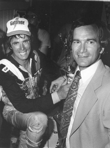 BRISTOL, TN - AUGUST 22, 1981:  Darrell Waltrip led all but two of the final laps at Bristol during the 1981 Busch 500 to win and close within 50 points of national leader Bobby Allison. Pictured with Waltrip in victory lane is speedway president Gary Baker.  (Photo by ISC Archives via Getty Images)