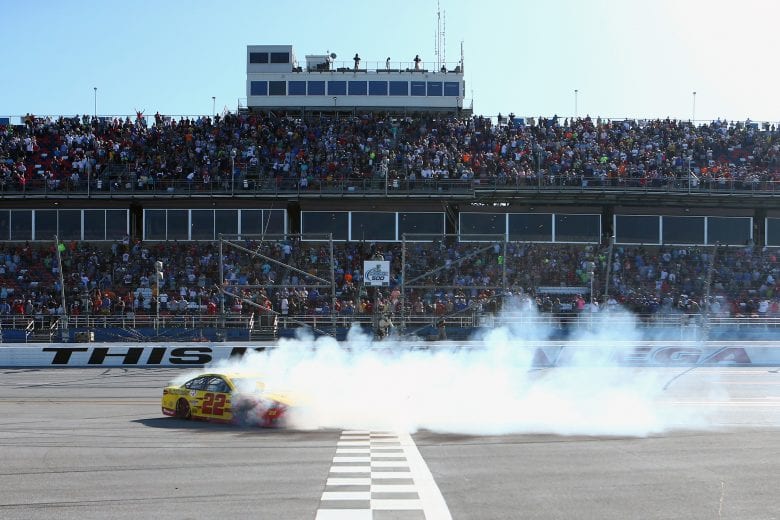 TALLADEGA, AL - APRIL 29:  Joey Logano, driver of the #22 Shell Pennzoil/Autotrader Ford, celebrates with a burnout after winning the Monster Energy NASCAR Cup Series GEICO 500 at Talladega Superspeedway on April 29, 2018 in Talladega, Alabama.  (Photo by Jared C. Tilton/Getty Images) | Getty Images