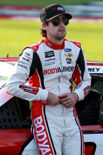 KANSAS CITY, KS - MAY 10: Ryan Blaney, driver of the #12 BodyArmor Ford, stands on pit road during qualifying for the Monster Energy NASCAR Cup Series Digital Ally 400 at Kansas Speedway on May 10, 2019 in Kansas City, Kansas. (Photo by Sean Gardner/Getty Images) | Getty Images