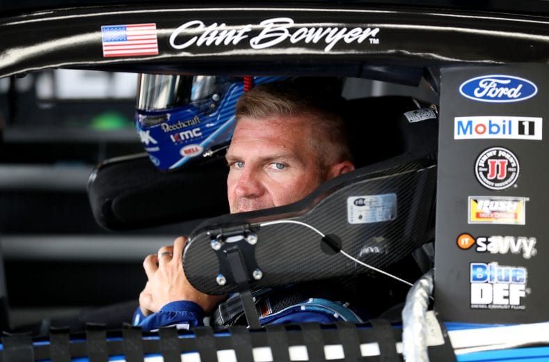 CHARLOTTE, NORTH CAROLINA - MAY 23: Clint Bowyer, driver of the #14 Peak Antifreeze & Coolant Ford, looks on in the garage during practice for the Monster Energy NASCAR Cup Series Coca-Cola 600 at Charlotte Motor Speedway on May 23, 2019 in Charlotte, North Carolina. (Photo by Streeter Lecka/Getty Images) | Getty Images