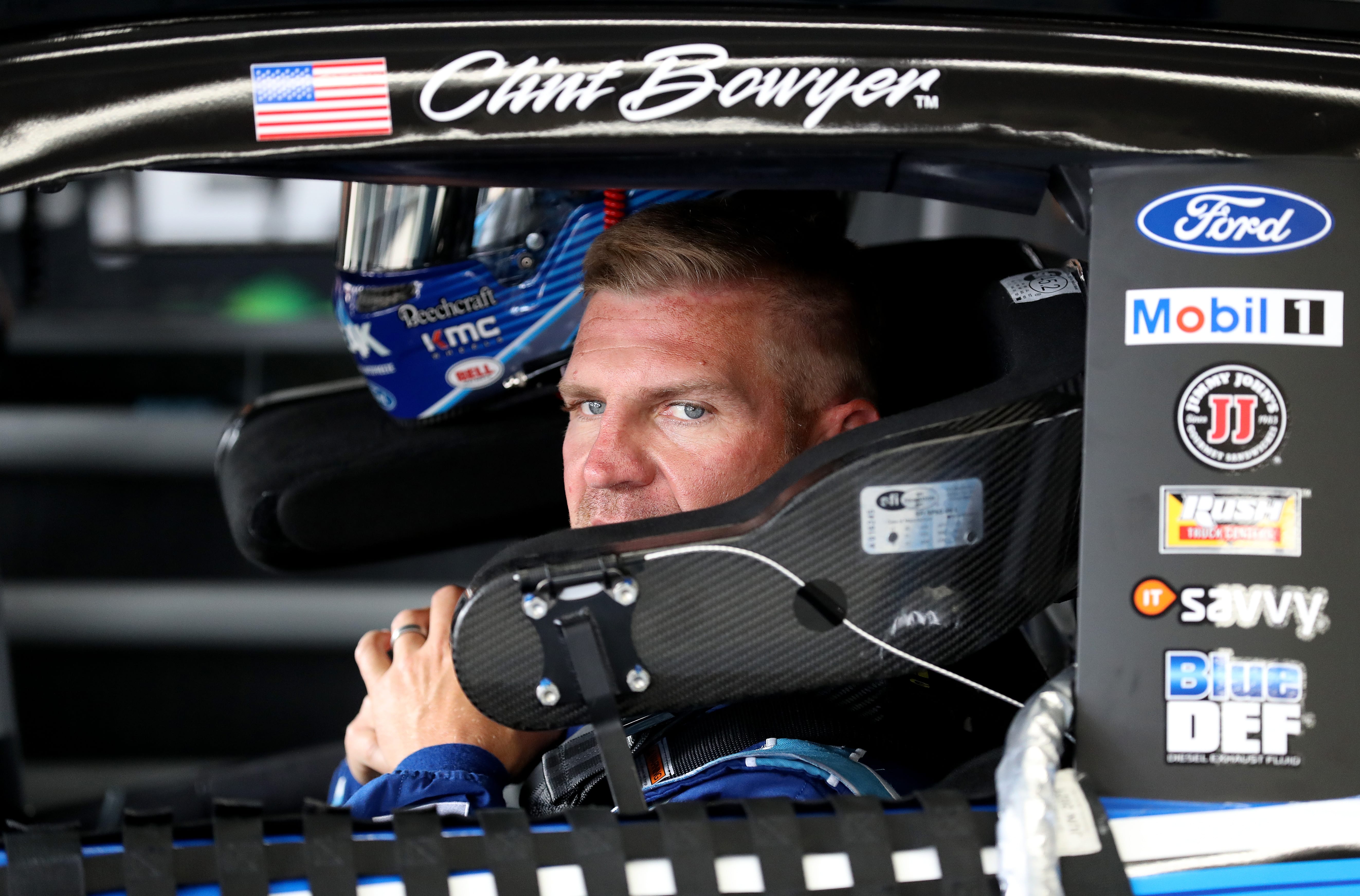 CHARLOTTE, NORTH CAROLINA - MAY 23: Clint Bowyer, driver of the #14 Peak Antifreeze & Coolant Ford, looks on in the garage during practice for the Monster Energy NASCAR Cup Series Coca-Cola 600 at Charlotte Motor Speedway on May 23, 2019 in Charlotte, North Carolina. (Photo by Streeter Lecka/Getty Images) | Getty Images