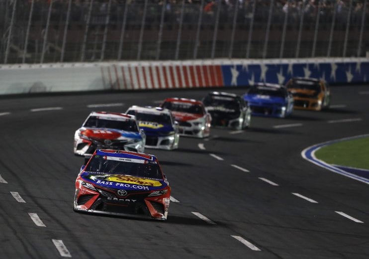 CHARLOTTE, NORTH CAROLINA - MAY 26: Martin Truex Jr., driver of the #19 Bass Pro Shops/TRACKER/USO Toyota, leads a pack of cars during the Monster Energy NASCAR Cup Series Coca-Cola 600 at Charlotte Motor Speedway on May 26, 2019 in Charlotte, North Carolina. (Photo by Streeter Lecka/Getty Images) | Getty Images