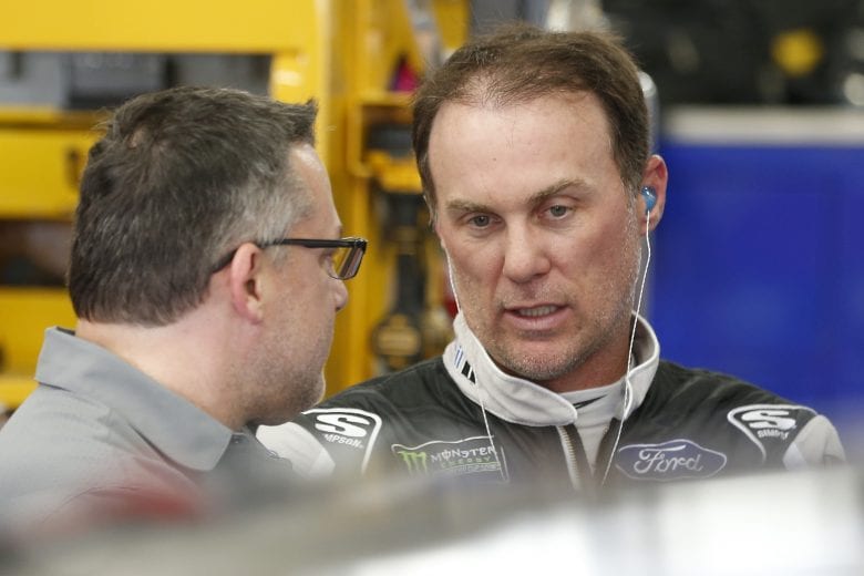 CHARLOTTE, NORTH CAROLINA - MAY 23: Kevin Harvick (R), driver of the #4 Mobil 1 Ford, speaks with team owner Tony Stewart during practice for the Monster Energy NASCAR Cup Series Coca-Cola 600 at Charlotte Motor Speedway on May 23, 2019 in Charlotte, North Carolina. (Photo by Brian Lawdermilk/Getty Images) | Getty Images