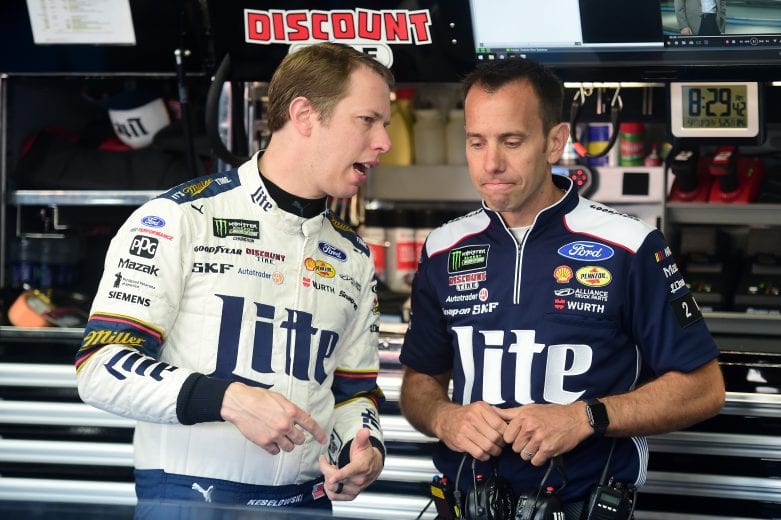 CHARLOTTE, NORTH CAROLINA - MAY 25: Brad Keselowski (L), driver of the #2 Miller Lite Ford, speaks with his crew chief Paul Wolfe in the garage area during practice for the Monster Energy NASCAR Cup Series Coca-Cola 600 at Charlotte Motor Speedway on May 25, 2019 in Charlotte, North Carolina. (Photo by Jared C. Tilton/Getty Images) | Getty Images