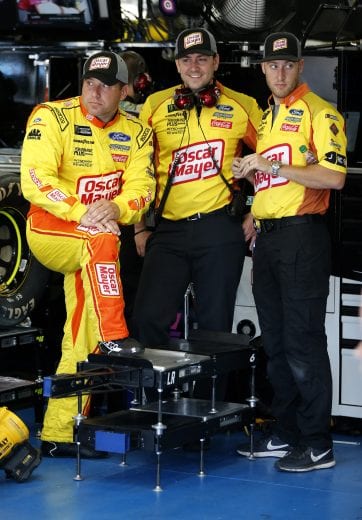 CHARLOTTE, NORTH CAROLINA - MAY 25: Ryan Newman, driver of the #6 Oscar Mayer Hot Dogs Ford, talks with crew members during practice for the Monster Energy NASCAR Cup Series Coca-Cola 600 at Charlotte Motor Speedway on May 25, 2019 in Charlotte, North Carolina. (Photo by Brian Lawdermilk/Getty Images) | Getty Images