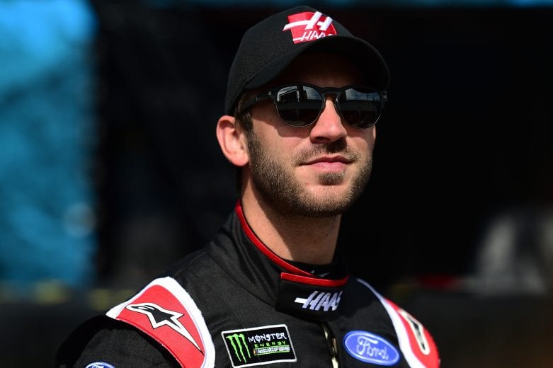 DAYTONA BEACH, FL - FEBRUARY 15:  Daniel Suarez, driver of the #41 Haas Automation Ford, stands in the garage area during practice for the Monster Energy NASCAR Cup Series 61st Annual Daytona 500  at Daytona International Speedway on February 15, 2019 in Daytona Beach, Florida.  (Photo by Jared C. Tilton/Getty Images) | Getty Images