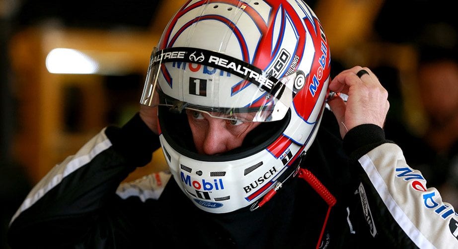 FORT WORTH, TX - MARCH 30:  Kevin Harvick, driver of the #4 Mobil 1/O'Reilly Auto Parts Ford, stands in the garage during practice for the Monster Energy NASCAR Cup Series O'Reilly Auto Parts 500 at Texas Motor Speedway on March 30, 2019 in Fort Worth, Texas.  (Photo by Sean Gardner/Getty Images) | Getty Images