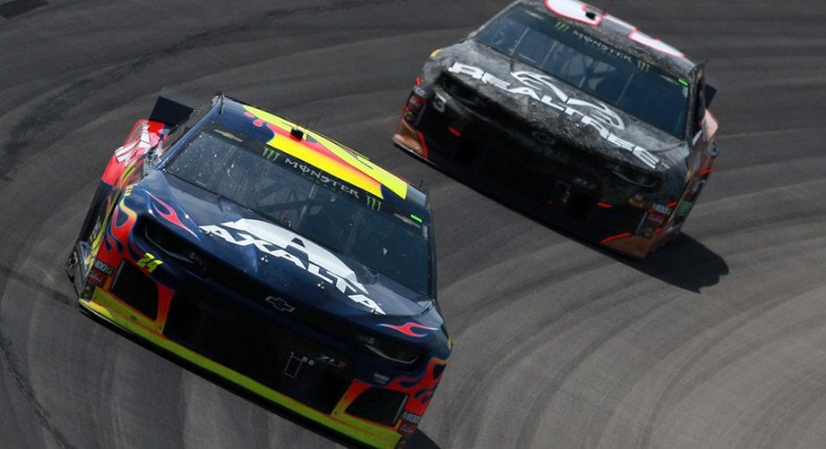 William Byron leads Austin Dillon into the corner.