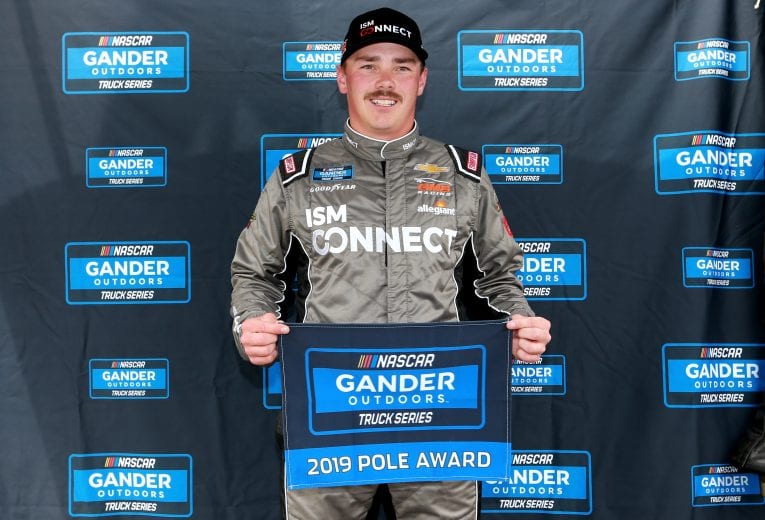 DOVER, DE - MAY 03: Brett Moffitt, driver of the #24 ISM Connect Chevrolet, poses with the pole award after qualifying for the NASCAR Gander Outdoors Truck Series JEGS 200 at Dover International Speedway on May 3, 2019 in Dover, Delaware. (Photo by Sean Gardner/Getty Images) | Getty Images