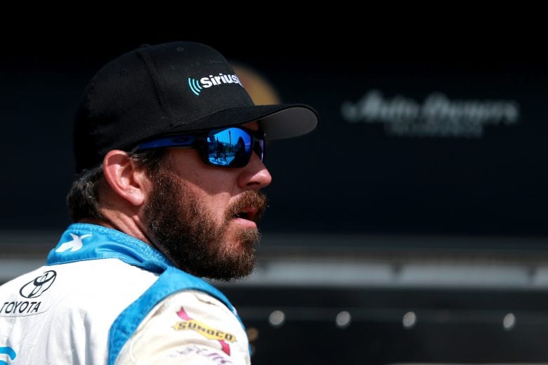 DOVER, DE - MAY 03: Martin Truex Jr., driver of the #19 SiriusXM Toyota, stands on pit road during qualifying for the Monster Energy NASCAR Cup Series Gander RV 400 at Dover International Speedway on May 3, 2019 in Dover, Delaware. (Photo by Sean Gardner/Getty Images) | Getty Images