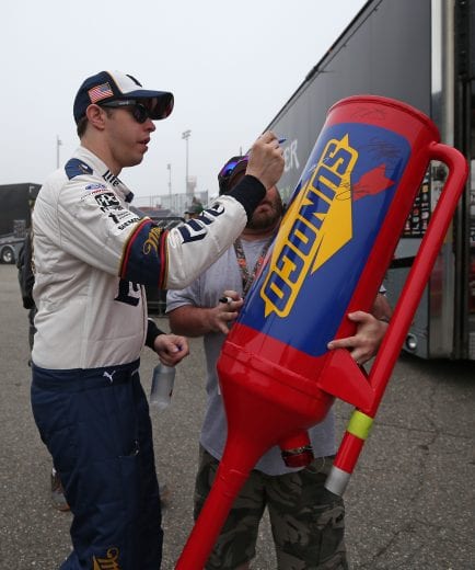 DOVER, DE - MAY 04: Brad Keselowski, driver of the #2 Miller Lite Ford, signs autographs during practice for the Monster Energy NASCAR Cup Series Gander RV 400 at Dover International Speedway on May 4, 2019 in Dover, Delaware. (Photo by Matt Sullivan/Getty Images) | Getty Images