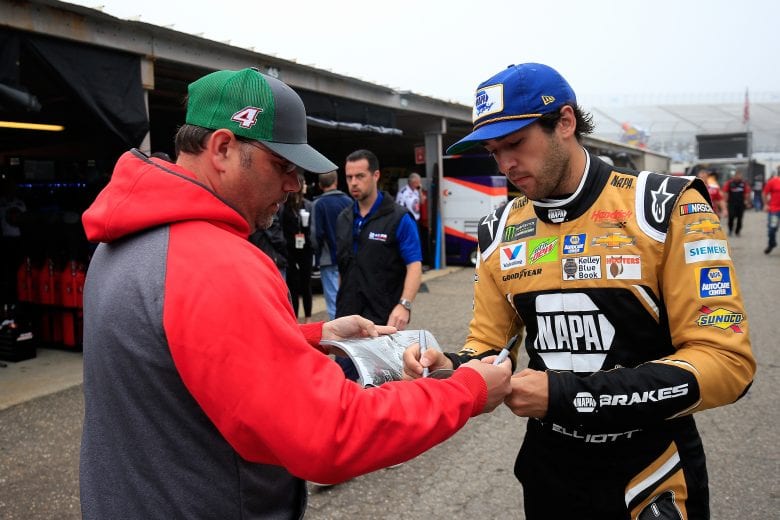 DOVER, DE - MAY 04: Chase Elliott, driver of the #9 NAPA Brakes Chevrolet, signs autographs during practice for the Monster Energy NASCAR Cup Series Gander RV 400 at Dover International Speedway on May 4, 2019 in Dover, Delaware. (Photo by Chris Trotman/Getty Images) | Getty Images