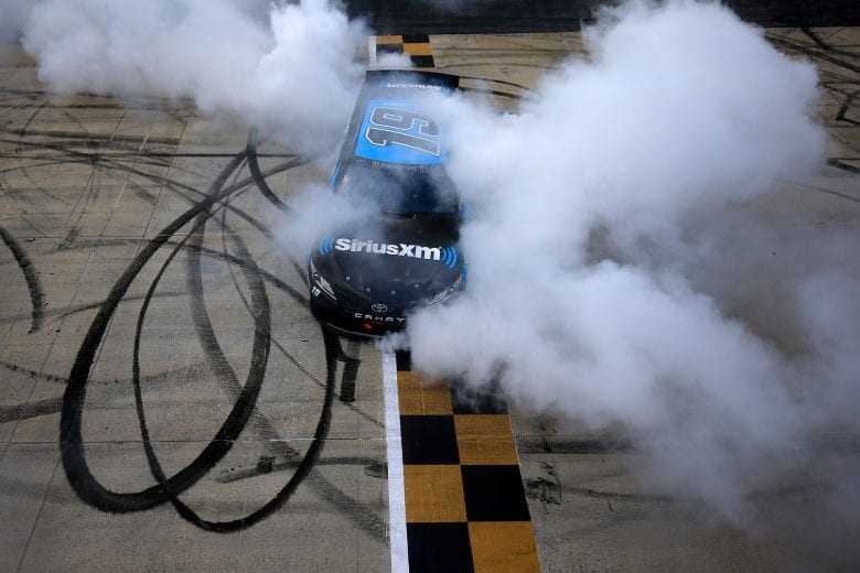 Martin Truex Jr. performs a burnout at Dover.