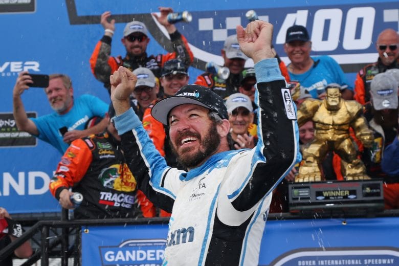 Martin Truex Jr. celebrates in Victory Lane at Dover.