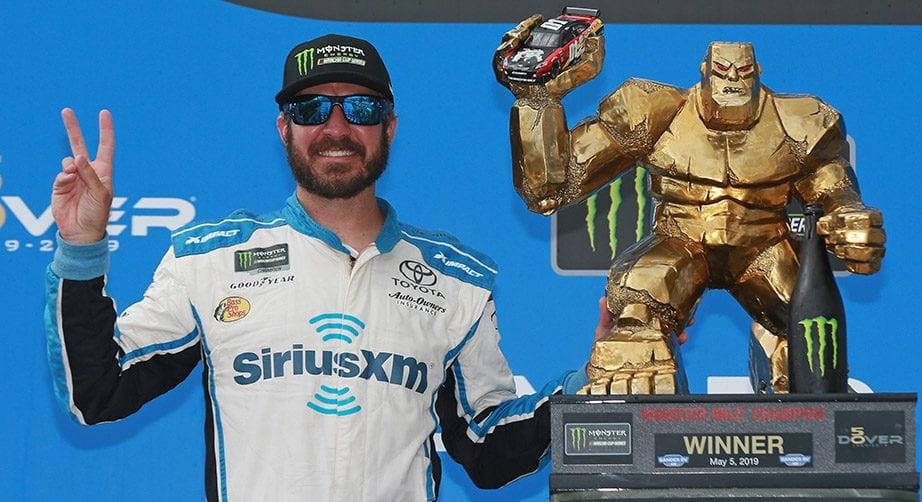 DOVER, DE - MAY 06:  Martin Truex Jr., driver of the #19 SiriusXM Toyota, poses with the trophy after winning the Monster Energy NASCAR Cup Series Gander RV 400 at Dover International Speedway on May 6, 2019 in Dover, Delaware.  (Photo by Sean Gardner/Getty Images) | Getty Images