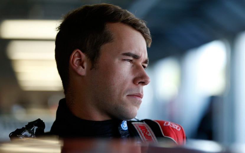 KANSAS CITY, KS - MAY 10:  Ben Rhodes, driver of the #99 Carolina Nut Ford, stands in the garage during practice for the NASCAR Gander Outdoors Truck Series Digital Ally 250 at Kansas Speedway on May 10, 2019 in Kansas City, Kansas.  (Photo by Brian Lawdermilk/Getty Images) | Getty Images