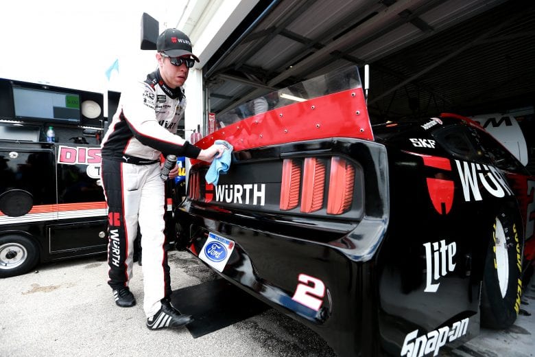 KANSAS CITY, KS - MAY 10:  Brad Keselowski, driver of the #2 Wurth Ford, cleans his car during practice for the Monster Energy NASCAR Cup Series Digital Ally 400 at Kansas Speedway on May 10, 2019 in Kansas City, Kansas.  (Photo by Sean Gardner/Getty Images) | Getty Images
