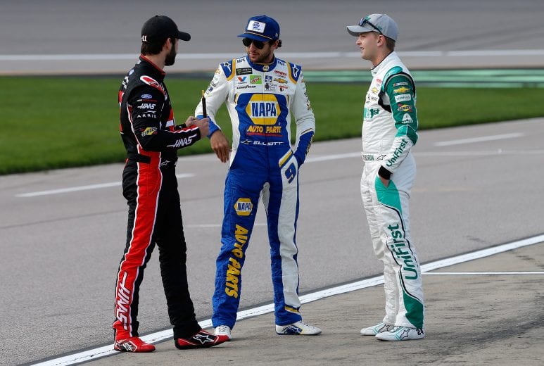 KANSAS CITY, KS - MAY 10:  Daniel Suarez, driver of the #41 Haas Automation Demo Day Ford,  talks with, ,9 and William Byron, driver of the #24 UniFirst Chevrolet, during qualifying for the Monster Energy NASCAR Cup Series Digital Ally 400 at Kansas Speedway on May 10, 2019 in Kansas City, Kansas.  (Photo by Brian Lawdermilk/Getty Images) | Getty Images