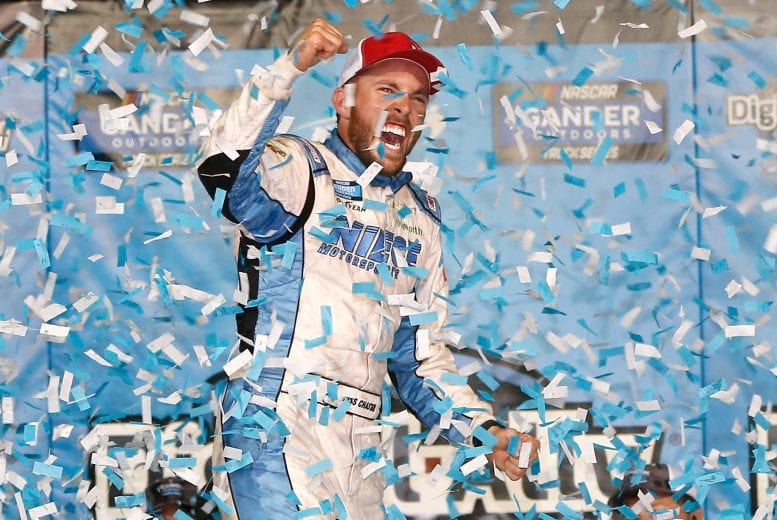 KANSAS CITY, KS - MAY 10:  Ross Chastain, driver of the #45 TruNorth/Paul Jr. Designs Chevrolet, celebrates in victory lane after winning the NASCAR Gander Outdoors Truck Series Digital Ally 250 at Kansas Speedway on May 10, 2019 in Kansas City, Kansas.  (Photo by Brian Lawdermilk/Getty Images) | Getty Images