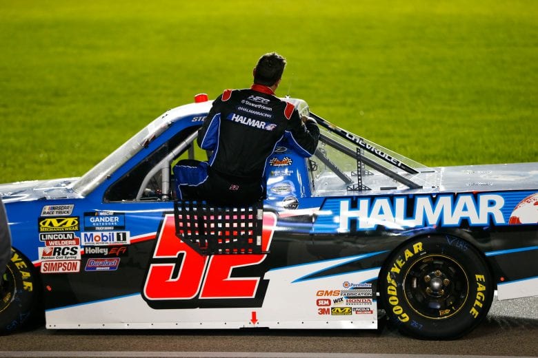 KANSAS CITY, KS - MAY 10:  Stewart Friesen, driver of the #52 Halmar International Chevrolet, climbs form his truck after running out of gas during the NASCAR Gander Outdoors Truck Series Digital Ally 250 at Kansas Speedway on May 10, 2019 in Kansas City, Kansas.  (Photo by Jonathan Ferrey/Getty Images) | Getty Images