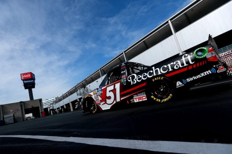 CHARLOTTE, NC - MAY 17:  Kyle Busch, driver of the #51 Cessna Toyota, drives through the garage during practice for the NASCAR Gander Outdoors Truck Series North Carolina Education Lottery 200 at Charlotte Motor Speedway on May 17, 2019 in Charlotte, North Carolina.  (Photo by Sean Gardner/Getty Images) | Getty Images