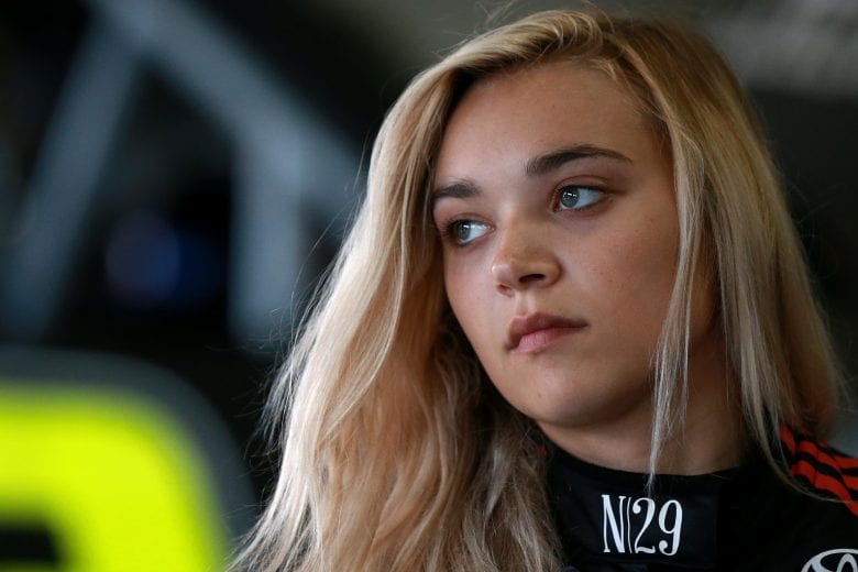 CHARLOTTE, NC - MAY 17:  Natalie Decker, driver of the #54 N29 Technologies LLC Toyota, stands in the garage during practice for the NASCAR Gander Outdoors Truck Series North Carolina Education Lottery 200 at Charlotte Motor Speedway on May 17, 2019 in Charlotte, North Carolina.  (Photo by Sean Gardner/Getty Images) | Getty Images