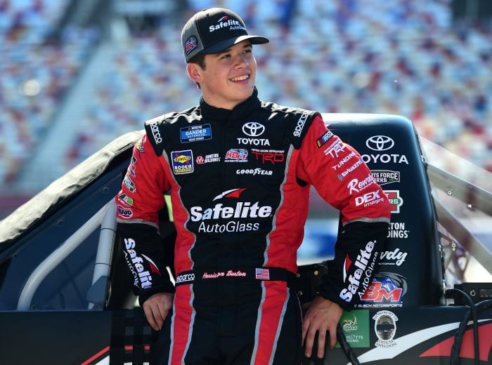 CHARLOTTE, NC - MAY 17:  Harrison Burton, driver of the #18 Safelite AutoGlass Toyota, stands on the grid during qualifying for the NASCAR Gander Outdoors Truck Series North Carolina Education Lottery 200 at Charlotte Motor Speedway on May 17, 2019 in Charlotte, North Carolina.  (Photo by Jared C. Tilton/Getty Images) | Getty Images