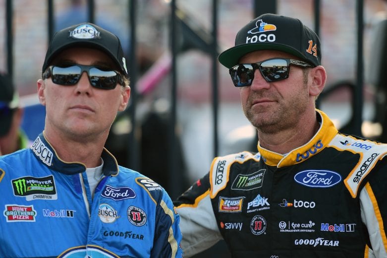 CHARLOTTE, NC - MAY 17:  Kevin Harvick, driver of the #4 Busch Beer Millenial Car Ford, and Clint Bowyer, driver of the #14 Toco Warranty Ford, look on during qualifying for the Monster Energy NASCAR Cup Series All-Star Race at Charlotte Motor Speedway on May 17, 2019 in Charlotte, North Carolina.  (Photo by Jared C. Tilton/Getty Images) | Getty Images
