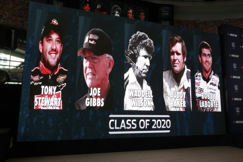 CHARLOTTE, NC - MAY 22: 2019 The class of Tony Stewart, Joe Gibbs, Waddell Wilson, Buddy Baker and Bobby Labonte are seen on a sign during the NASCAR 2020 Hall of Fame announcement ceremony at the NASCAR Hall of Fame on May 22, 2019 in Charlotte, North Carolina. (Photo by Jason Miczek/Getty Images) | Getty Images