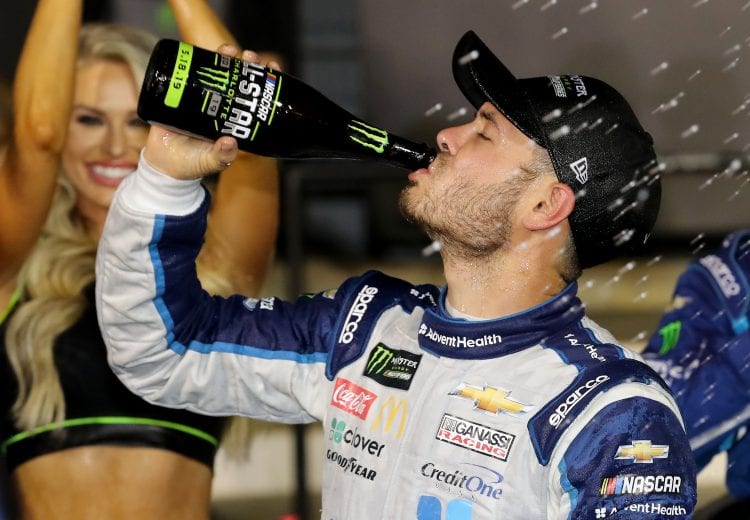 CHARLOTTE, NORTH CAROLINA - MAY 18: Kyle Larson, driver of the #42 Advent Health Chevrolet, celebrates in Victory Lane after winning the Monster Energy NASCAR Cup Series All-Star Race at Charlotte Motor Speedway on May 18, 2019 in Charlotte, North Carolina. (Photo by Streeter Lecka/Getty Images) | Getty Images