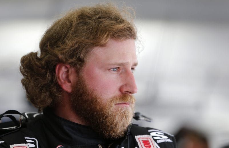 CHARLOTTE, NORTH CAROLINA - MAY 23: Jeffrey Earnhardt, driver of the #18 iK9 Toyota, stands in the garage during practice for the NASCAR Xfinity Series Alsco 300 at Charlotte Motor Speedway on May 23, 2019 in Charlotte, North Carolina. (Photo by Brian Lawdermilk/Getty Images) | Getty Images