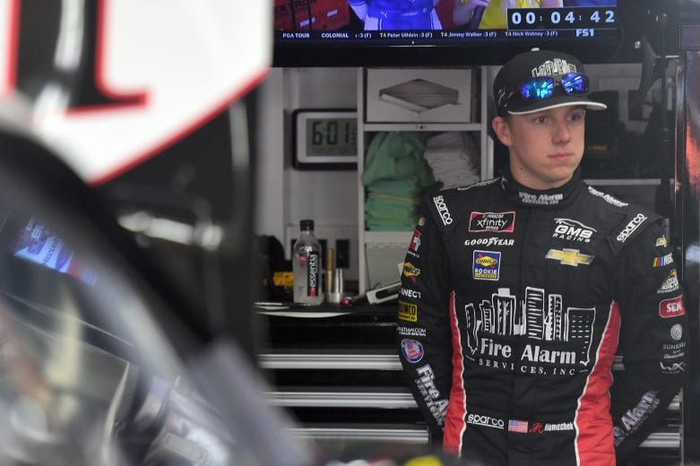 CHARLOTTE, NORTH CAROLINA - MAY 23: John Hunter Nemechek, driver of the #23 Fire Alarm Services INC Chevrolet, stands in the garage area during practice for the NASCAR Xfinity Series Alsco 300 at Charlotte Motor Speedway on May 23, 2019 in Charlotte, North Carolina. (Photo by Jared C. Tilton/Getty Images) | Getty Images