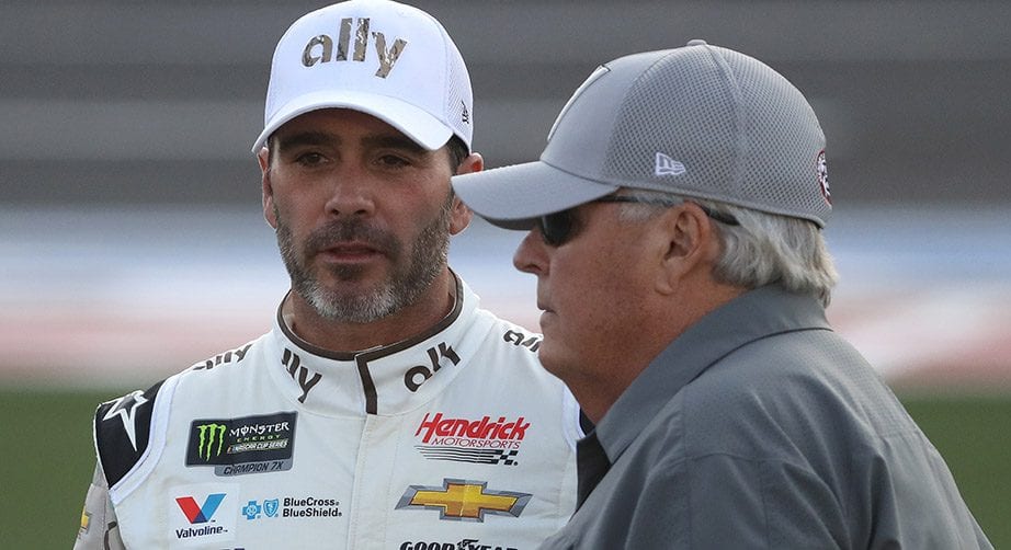 CHARLOTTE, NORTH CAROLINA - MAY 23: (L-R) Jimmie Johnson, driver of the #48 Ally Patriotic ChevroleJimmie Johnson, and NASCAR Hall of Famer and team owner Rick Hendrick talk during qualifying for the Monster Energy NASCAR Cup Series Race Coca-Cola 600 at Charlotte Motor Speedway on May 23, 2019 in Charlotte, North Carolina. (Photo by Streeter Lecka/Getty Images) | Getty Images