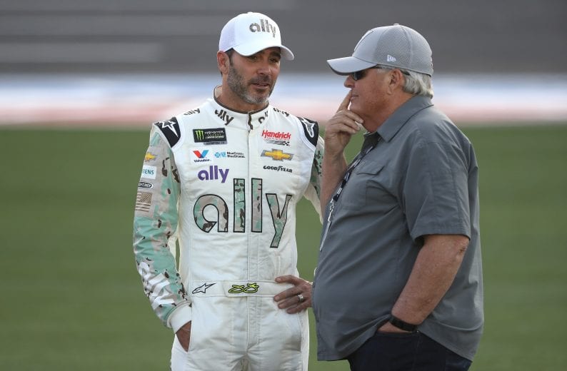 CHARLOTTE, NORTH CAROLINA - MAY 23: (L-R) Jimmie Johnson, driver of the #48 Ally Patriotic ChevroleJimmie Johnson, and NASCAR Hall of Famer and team owner Rick Hendrick talk during qualifying Monster Energy NASCAR Cup Series Open Race Coca-Cola 600 at Charlotte Motor Speedway on May 23, 2019 in Charlotte, North Carolina. (Photo by Streeter Lecka/Getty Images) | Getty Images