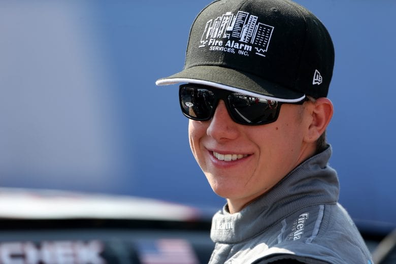 CHARLOTTE, NORTH CAROLINA - MAY 25: John Hunter Nemechek, driver of the #23 Fire Alarm Services INC Chevrolet, stands on the grid during qualifying for the NASCAR Xfinity Series Alsco 300 at Charlotte Motor Speedway on May 25, 2019 in Charlotte, North Carolina. (Photo by Brian Lawdermilk/Getty Images) | Getty Images