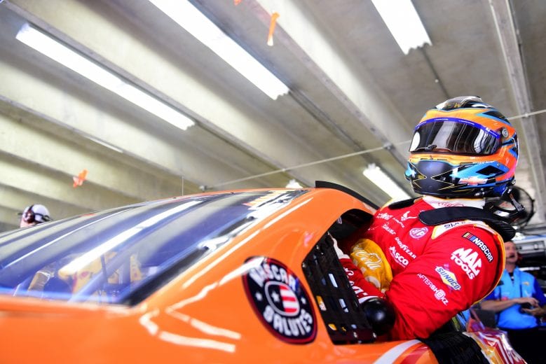 CHARLOTTE, NORTH CAROLINA - MAY 25: Bubba Wallace, driver of the #43 Coca-Cola Orange Vanilla Chevrolet, climbs into his car during practice for the Monster Energy NASCAR Cup Series Coca-Cola 600 at Charlotte Motor Speedway on May 25, 2019 in Charlotte, North Carolina. (Photo by Jared C. Tilton/Getty Images) | Getty Images