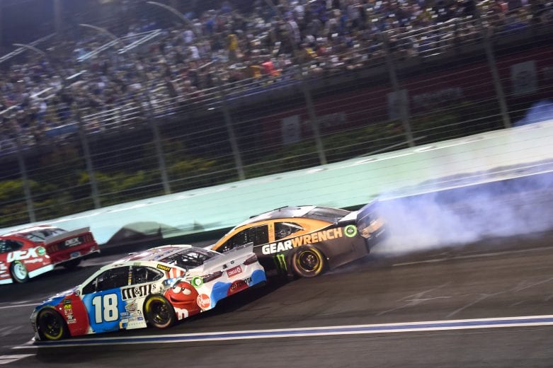 CHARLOTTE, NORTH CAROLINA - MAY 26: Kyle Busch, driver of the #18 M&M's Red White & Blue Toyota, and Kurt Busch, driver of the #1 GEARWRENCH Chevrolet, are involved in an on-track incident during the Monster Energy NASCAR Cup Series Coca-Cola 600 at Charlotte Motor Speedway on May 26, 2019 in Charlotte, North Carolina. (Photo by Jared C. Tilton/Getty Images) | Getty Images