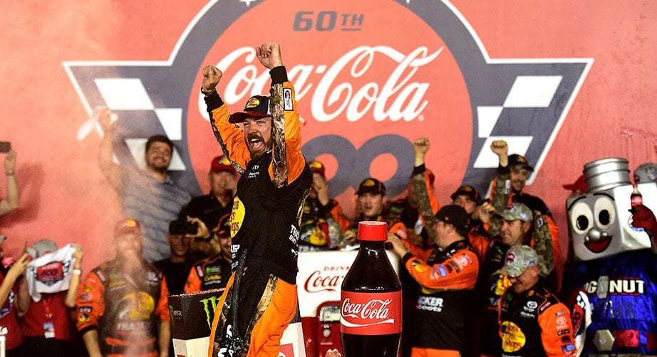 Martin Truex Jr. celebrates in Victory Lane after winning the 2019 Coca-Cola 600 at Charlotte.