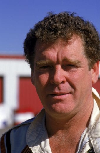 RIVERSIDE, 1984:  Driver Buddy Baker poses for a photo during the NASCAR Winston West. 500 in 1984 at Riverside International Raceway in Riverside, California.  (Photo by Mike Powell/Getty Images) | Getty Images