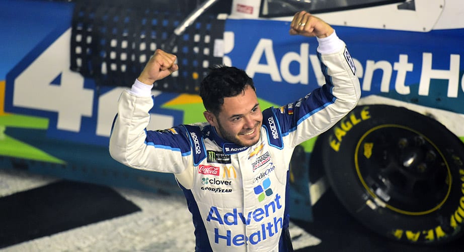 Kyle Larson celebrates winning the 2019 Monster Energy NASCAR All-Star Race.