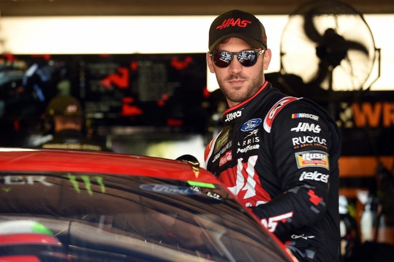 BROOKLYN, MICHIGAN - JUNE 07: Daniel Suarez, driver of the #41 Haas Automation Demo Day Ford, gets into his car during practice for the Monster Energy NASCAR Cup Series FireKeepers Casino 400 at Michigan International Speedway on June 07, 2019 in Brooklyn, Michigan. (Photo by Logan Riely/Getty Images) | Getty Images