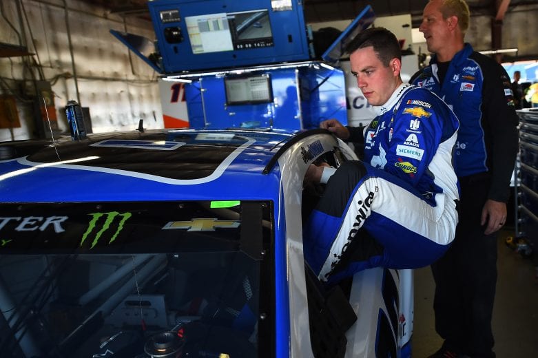BROOKLYN, MICHIGAN - JUNE 07: Alex Bowman, driver of the #88 Nationwide Chevrolet, gets into his car during practice for the Monster Energy NASCAR Cup Series FireKeepers Casino 400 at Michigan International Speedway on June 07, 2019 in Brooklyn, Michigan. (Photo by Stacy Revere/Getty Images) | Getty Images